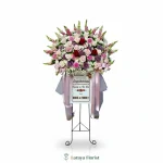 Standing flower warna pastel pink dan ungu elegan untuk grand opening dan ucapan selamat dengan desain anggun.