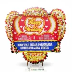 papan bunga wedding merah kuning